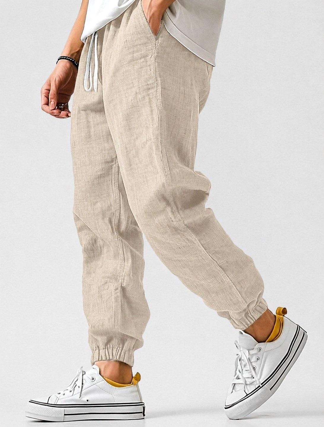 Franciszek | Męskie spodnie jogger ze ściągaczem, letnie spodnie o kroju tapered | Rokishi | Khaki